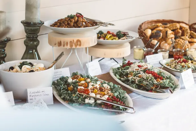 assorted food on white ceramic plates